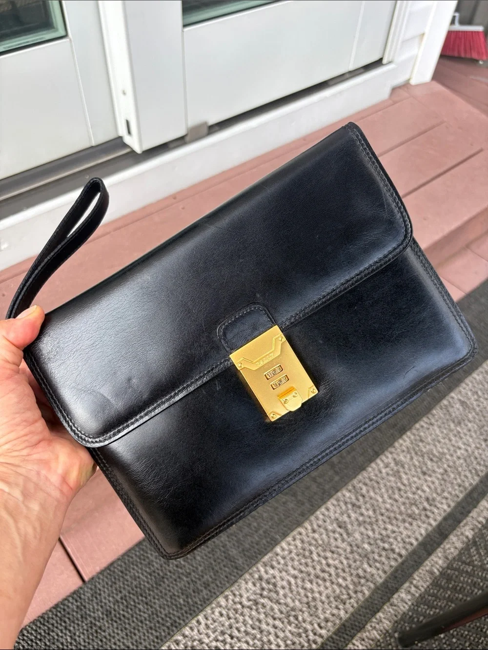Bally Black Leather Wristlet with Gold-Tone Lock Unisex